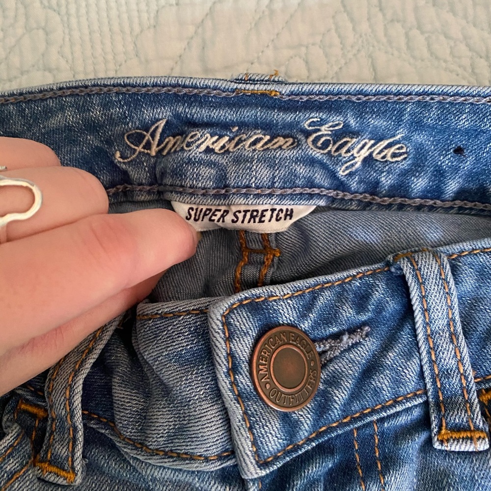 American Eagle light wash super stretch jeans